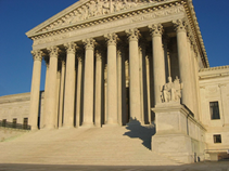 United States Supreme Court Building with columns and a statue

AI-generated content may be incorrect.